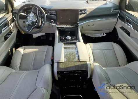 2022 Jeep Wagoneer Series Iii z USA, uszkodzony, nr VIN 1C4SJVDT4NS142144